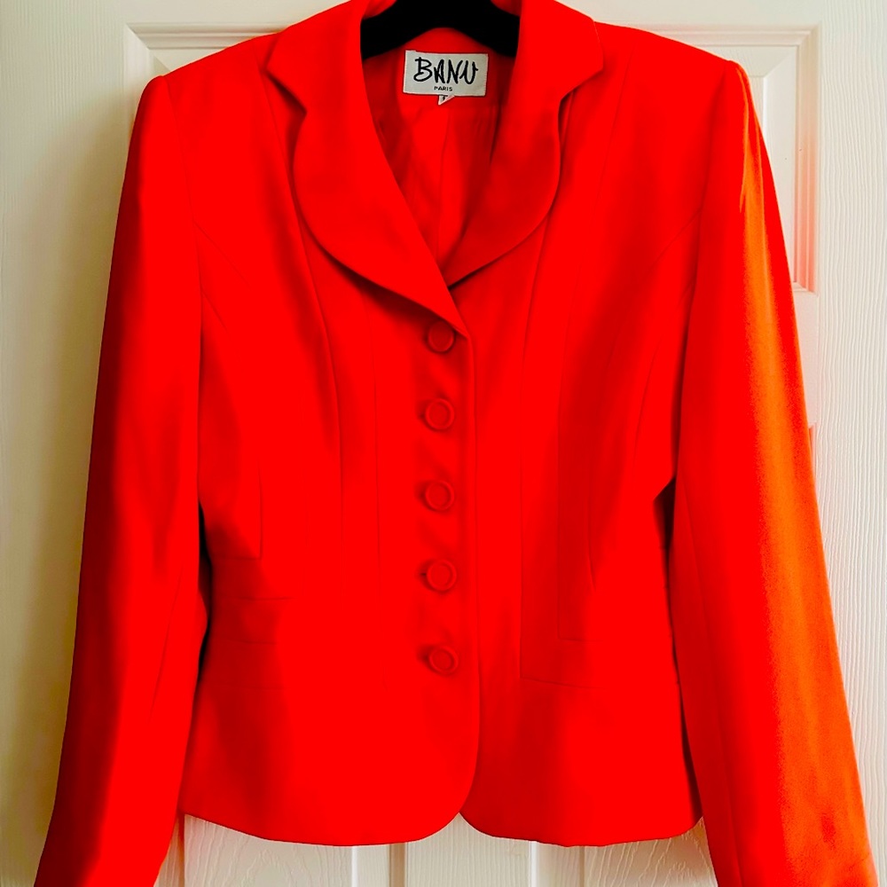 Beautiful size 10 orange button front suit with buttons on sleeve.